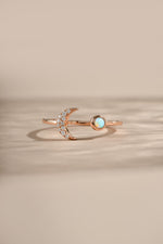 Rose gold Opal and CZ moon ring by Samijewels-527 featuring a moon-shaped design with sparkling stones and a polished finish.