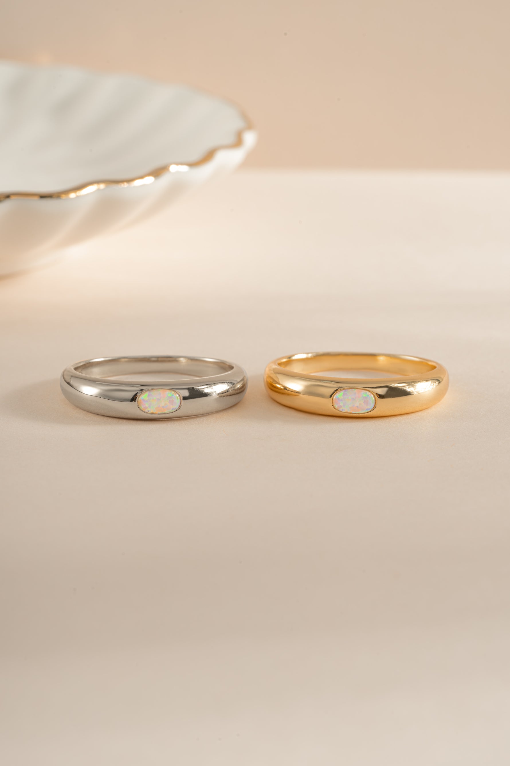 Gold and sterling silver Opal Dome Ring by Sami Jewels featuring a smooth, rounded opal gemstone setting.