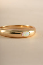 Close-up of Sami Jewels gold Opal Dome Ring showcasing the smooth, rounded opal gemstone on a sleek gold band.