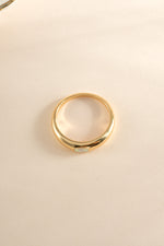 Gold Opal Dome Ring by Sami Jewels, top view showcasing the smooth, rounded opal gemstone set in a sleek gold band.