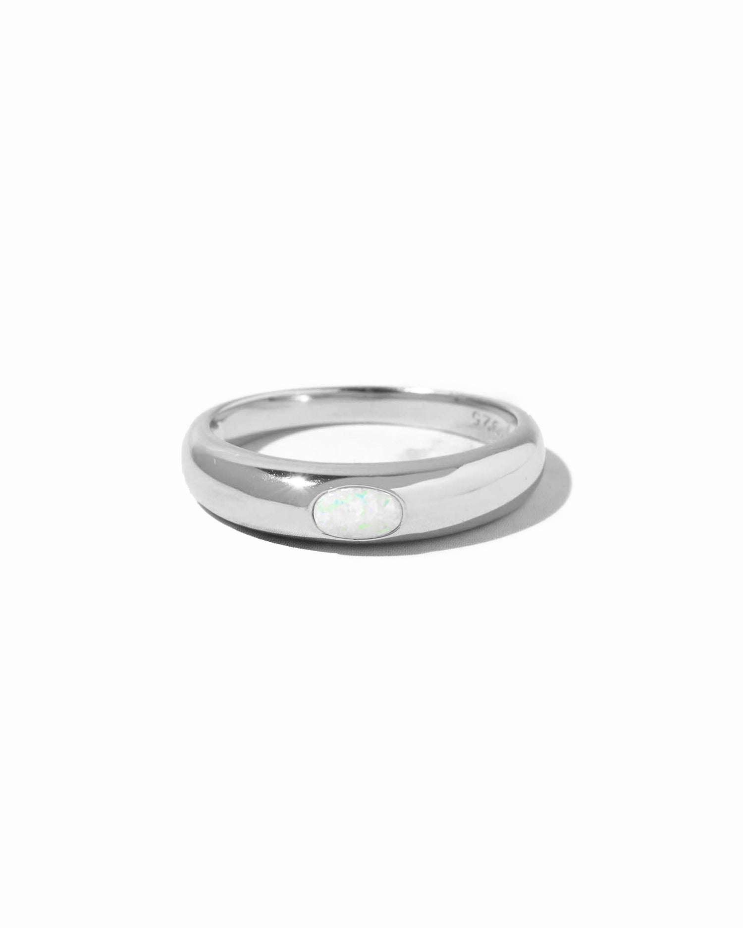 Sterling silver Opal Dome Ring by Sami Jewels featuring a smooth, rounded opal gemstone on a sleek band.