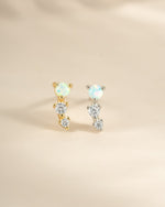 Gold and sterling silver opal ear climber earrings by Sami Jewels, featuring sparkling opal stones and elegant design.