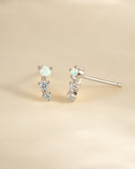 Sterling silver opal ear climber earrings with vibrant, iridescent opal stones designed for elegant ear adornment by Sami Jewels