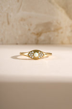 Gold Opal Evil Eye Ring by Sami Jewels, front view showing the detailed evil eye design on a sleek ring.