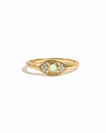 Gold Opal Evil Eye Ring by Sami Jewels featuring a colorful opal stone and protective evil eye design on a white background.