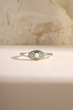 Sterling silver Opal Evil Eye Ring by Sami Jewels featuring a vibrant opal center and protective evil eye design.