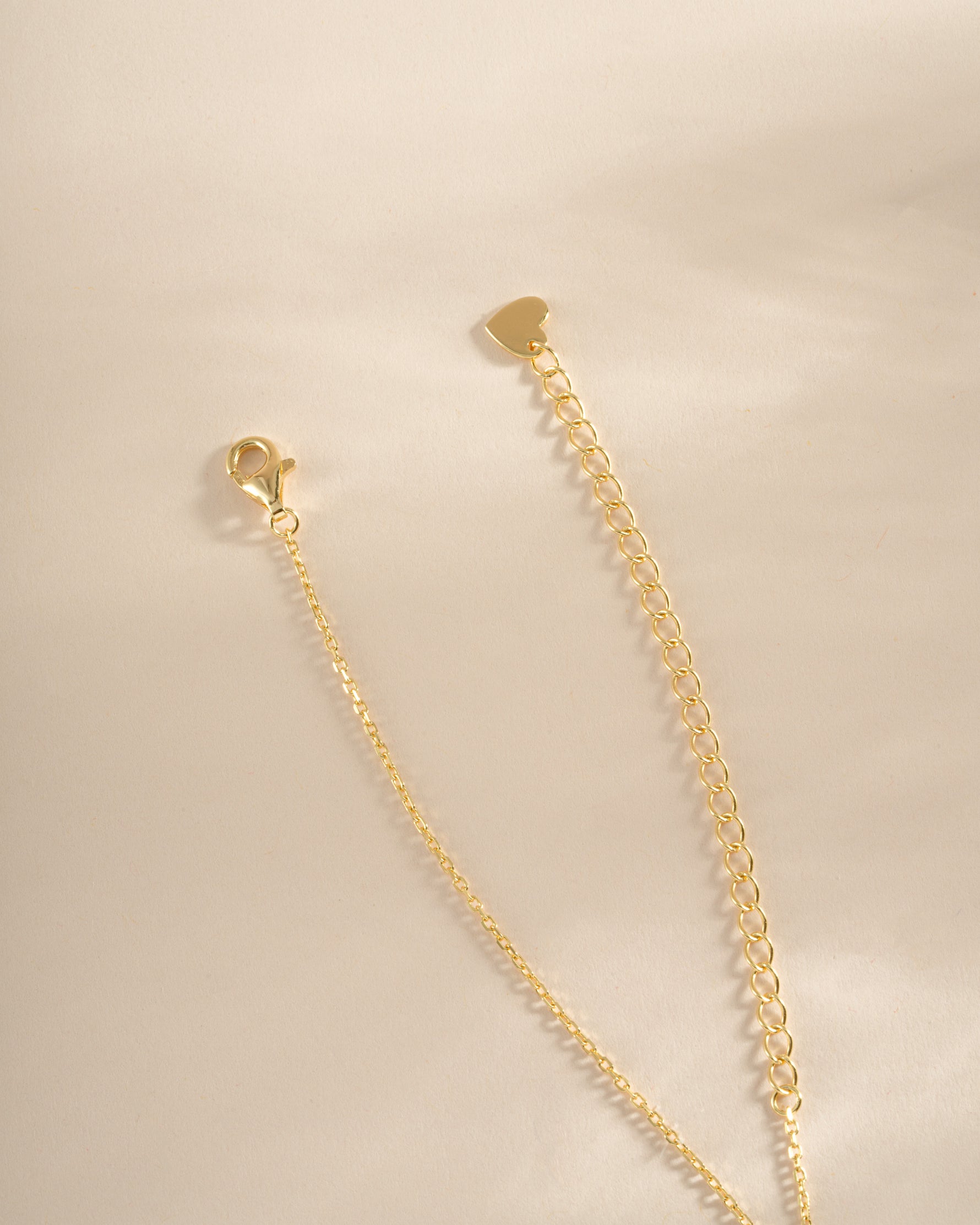 Gold Opal Flower Charm Necklace with lobster clasp closure by Sami Jewels, featuring a delicate floral pendant design.