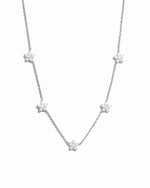 Sterling silver Opal Flower Charm Necklace by Sami Jewels featuring a delicate opal flower pendant on a sleek chain.