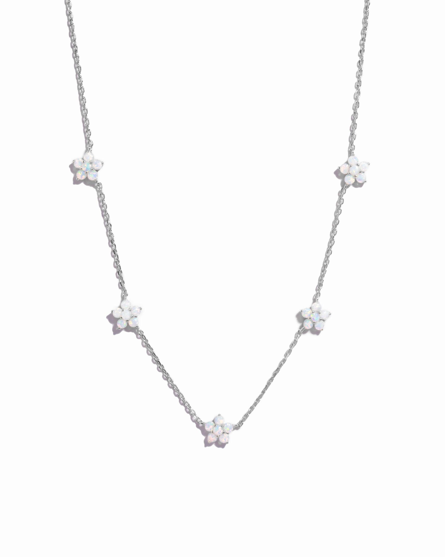 Sterling silver Opal Flower Charm Necklace by Sami Jewels featuring a delicate opal flower pendant on a sleek chain.