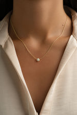 Gold Opal Flower Necklace by Sami Jewels featuring a delicate floral design with vibrant opal stones.