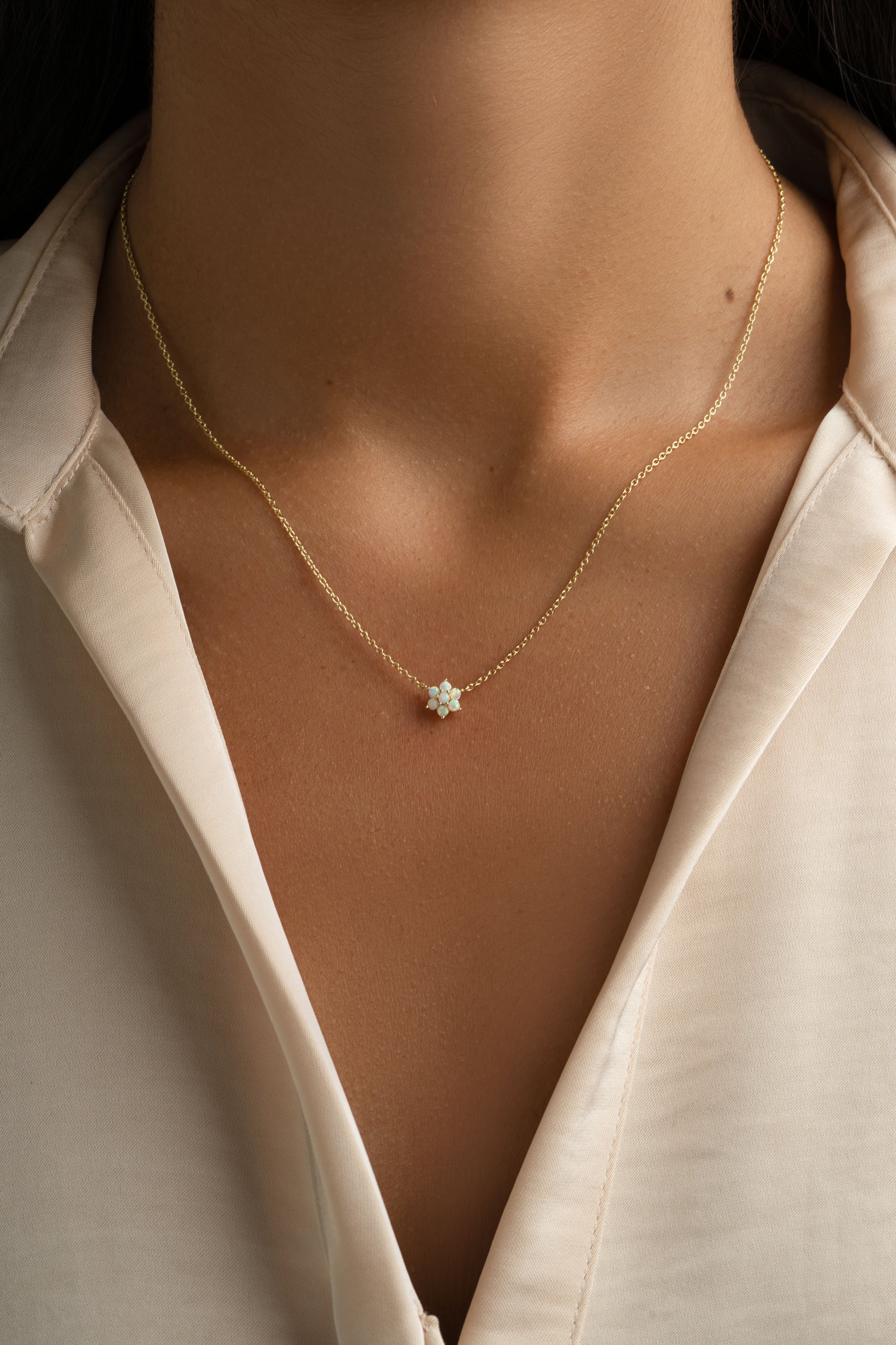 Gold Opal Flower Necklace by Sami Jewels featuring a delicate floral design with vibrant opal stones.