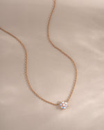 Rose gold opal flower necklace from Sami Jewels, featuring a delicate floral design and sparkling gemstone centerpiece.