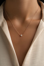 Opal flower necklace by Sami Jewels featuring a delicate rose gold chain and a vibrant opal flower pendant.