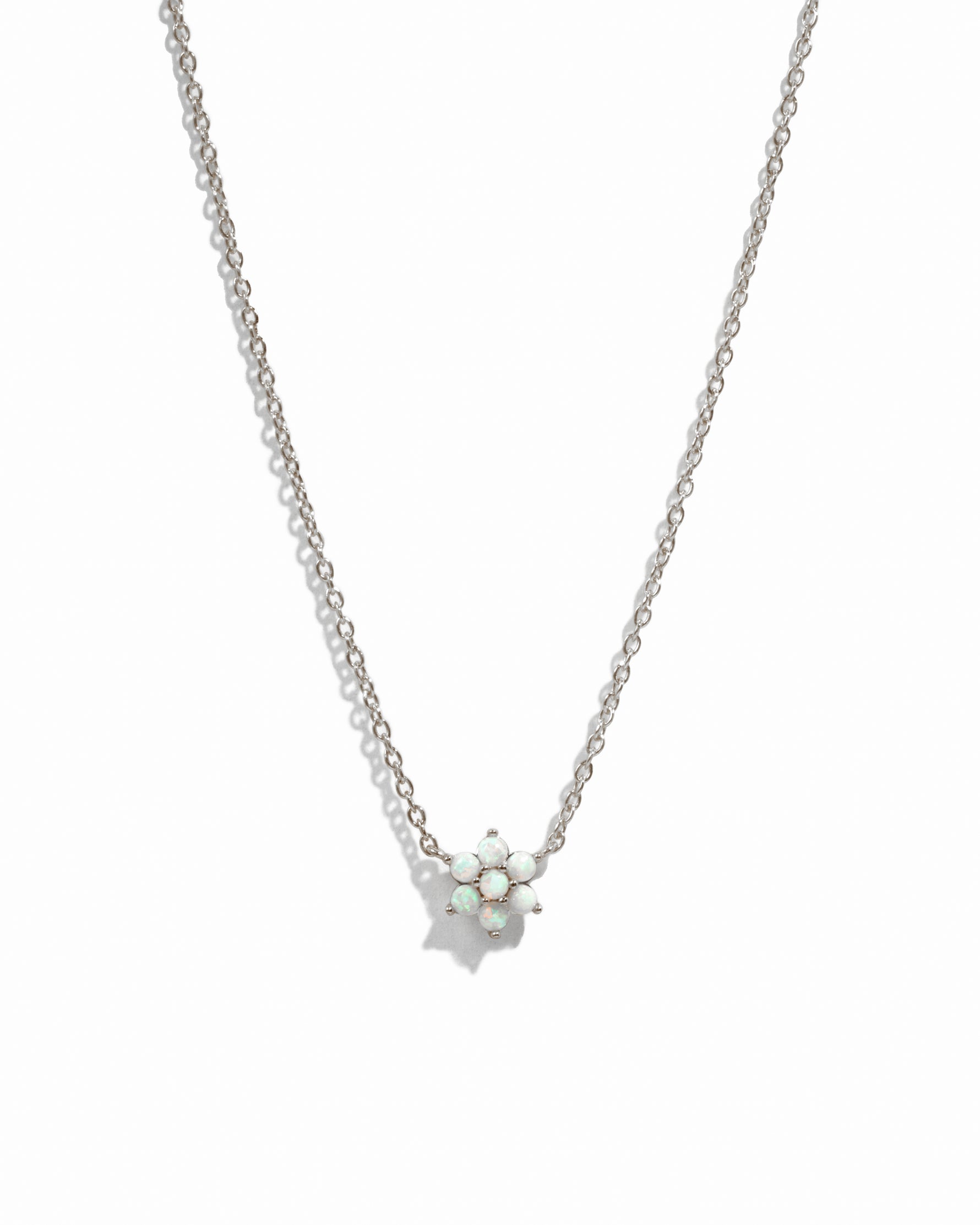 Sterling silver Opal Flower Necklace by Sami Jewels with a delicate floral design on a white background.