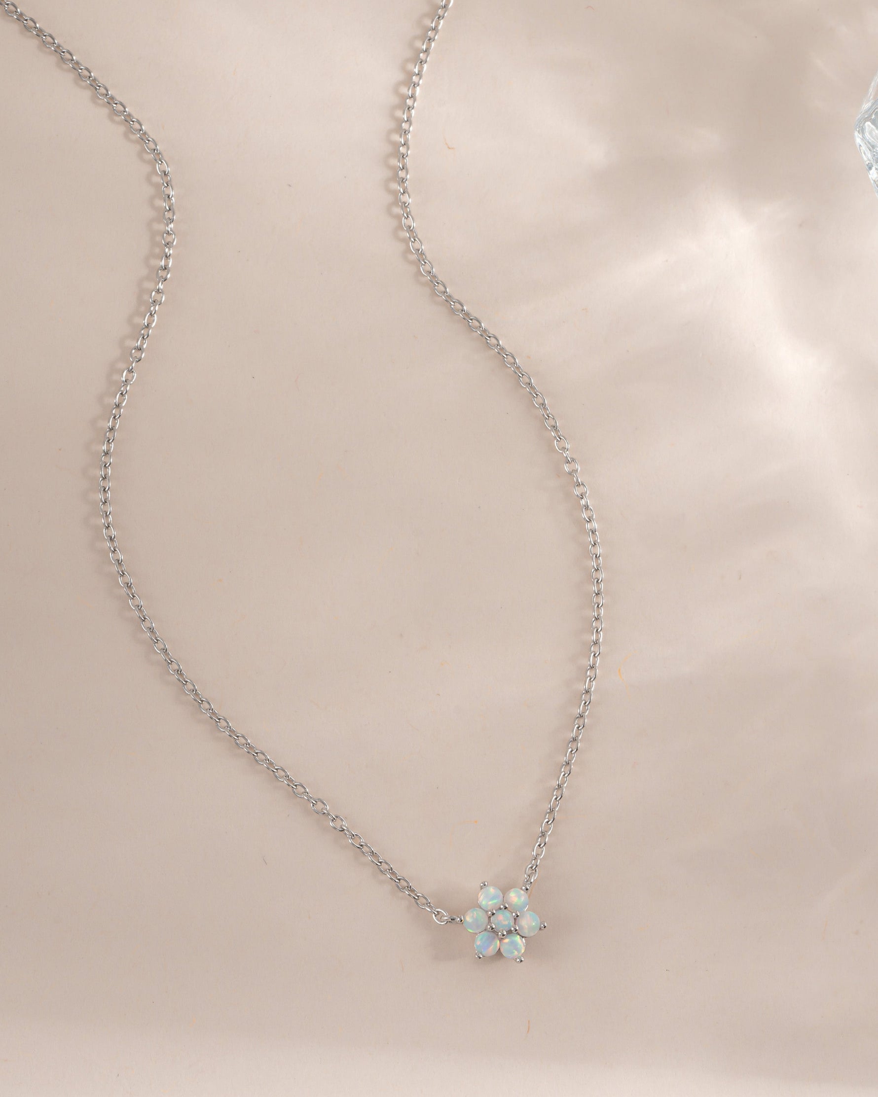 Sterling silver Opal Flower Necklace by Sami Jewels featuring a vibrant opal flower pendant on a delicate chain.