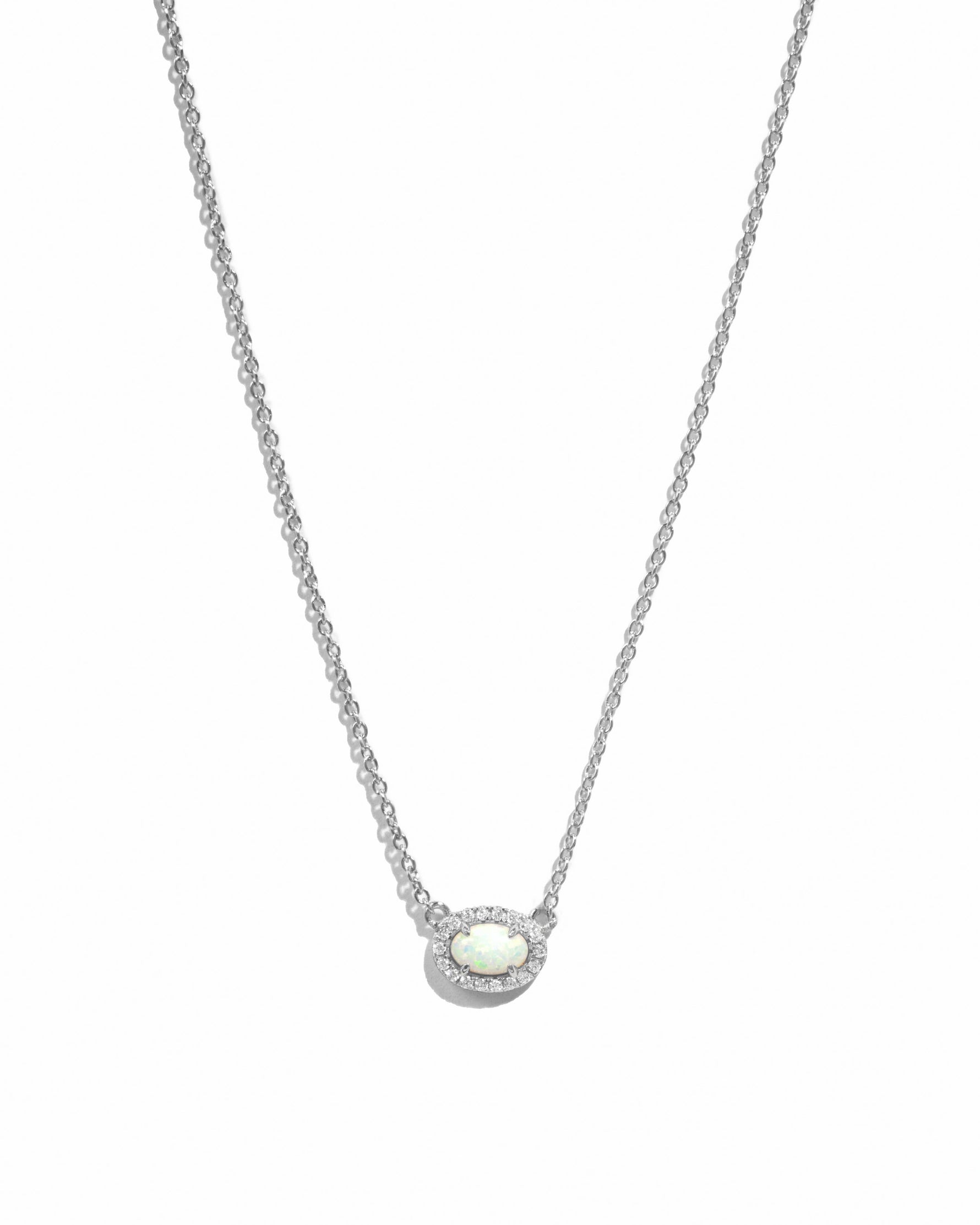 Sterling silver Opal Halo Necklace by Sami Jewels with a central opal gemstone and halo design, displayed against a white background.
