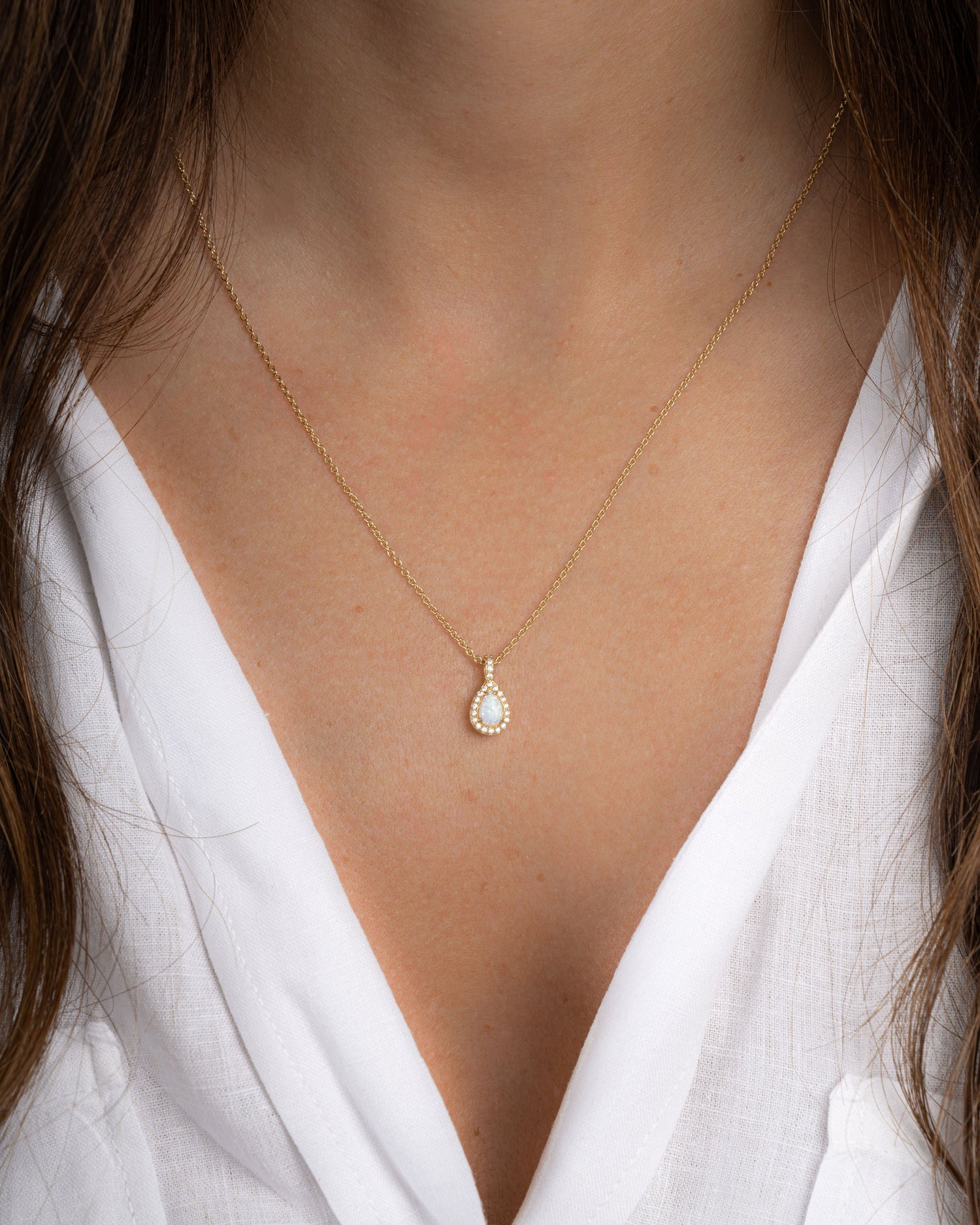 Gold Opal Pear Pendant Necklace featuring a smooth, polished opal teardrop gemstone on a delicate chain by Sami Jewels.