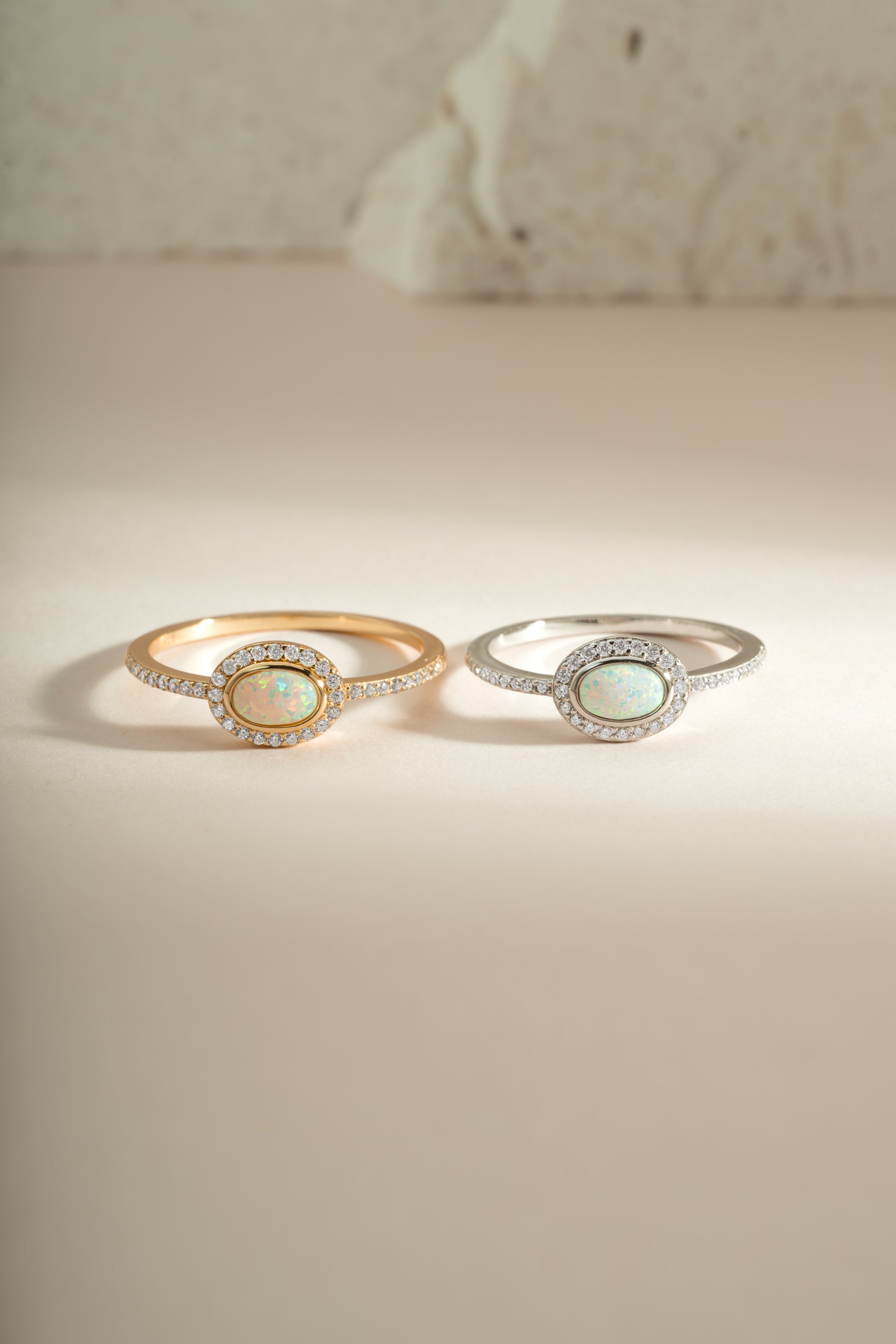 Sami Jewels Opal Halo Ring featuring a vibrant opal gemstone set in gold and sterling silver band.