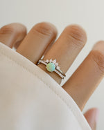 Sami Jewels opal ring set with pave design featuring sterling silver rings, showcasing vibrant opal stones and intricate detailing.