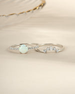 Sterling silver opal ring set with pave detail from Sami Jewels, featuring vibrant opal stones and intricate band designs.