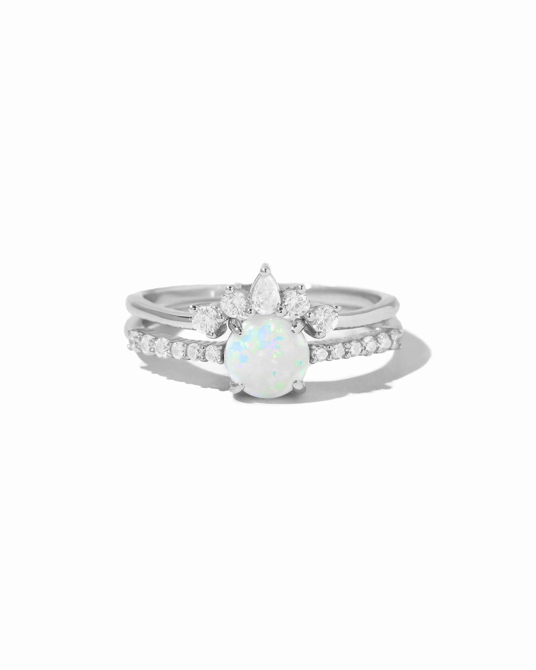 Sterling silver opal ring set with pave detail showcasing vibrant white and blue opals, designed by Sami Jewels.