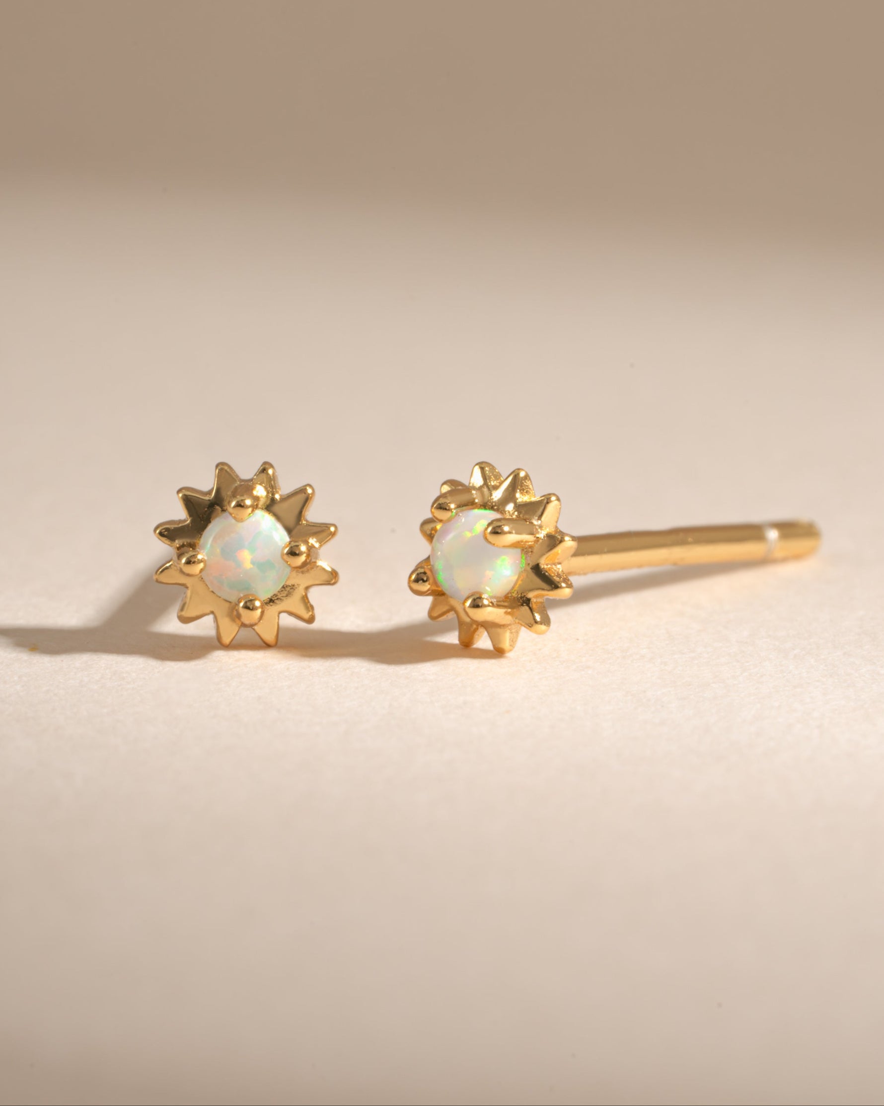 Gold Opal Tiny Sunburst Stud Earrings by Samijewels-527, featuring small sunburst design with iridescent opal stones.