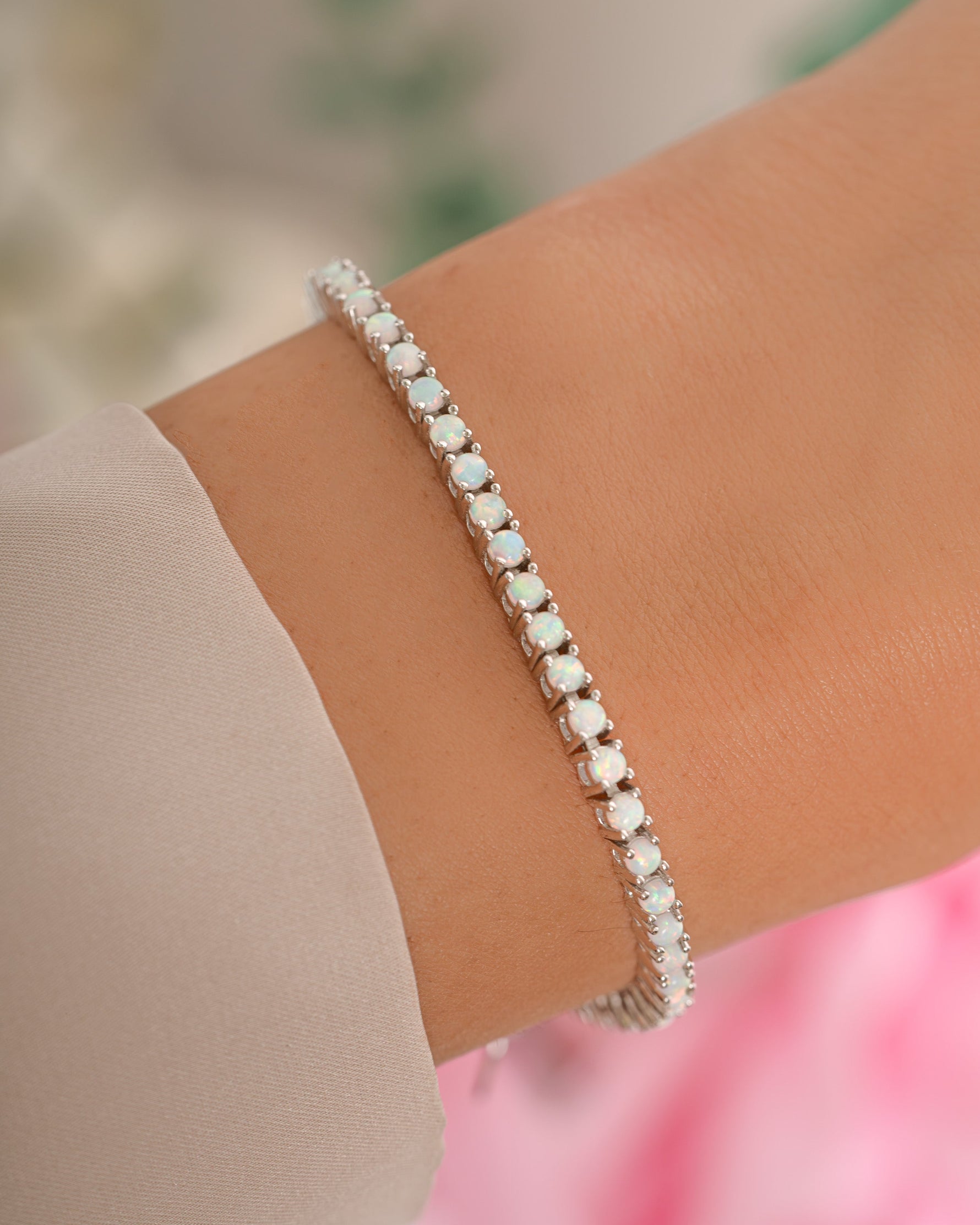 Sterling silver Opal Tennis Bracelet by Sami Jewels showcasing vibrant opal stones arranged in a sleek bracelet design.