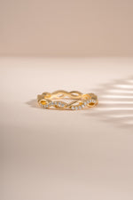 Gold open infinity ring by Sami Jewels featuring a sleek, minimalist design and smooth finish, viewed from the front.