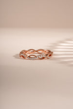 Rose gold open infinity ring by Sami Jewels featuring a sleek, minimalist design with a continuous infinity symbol.