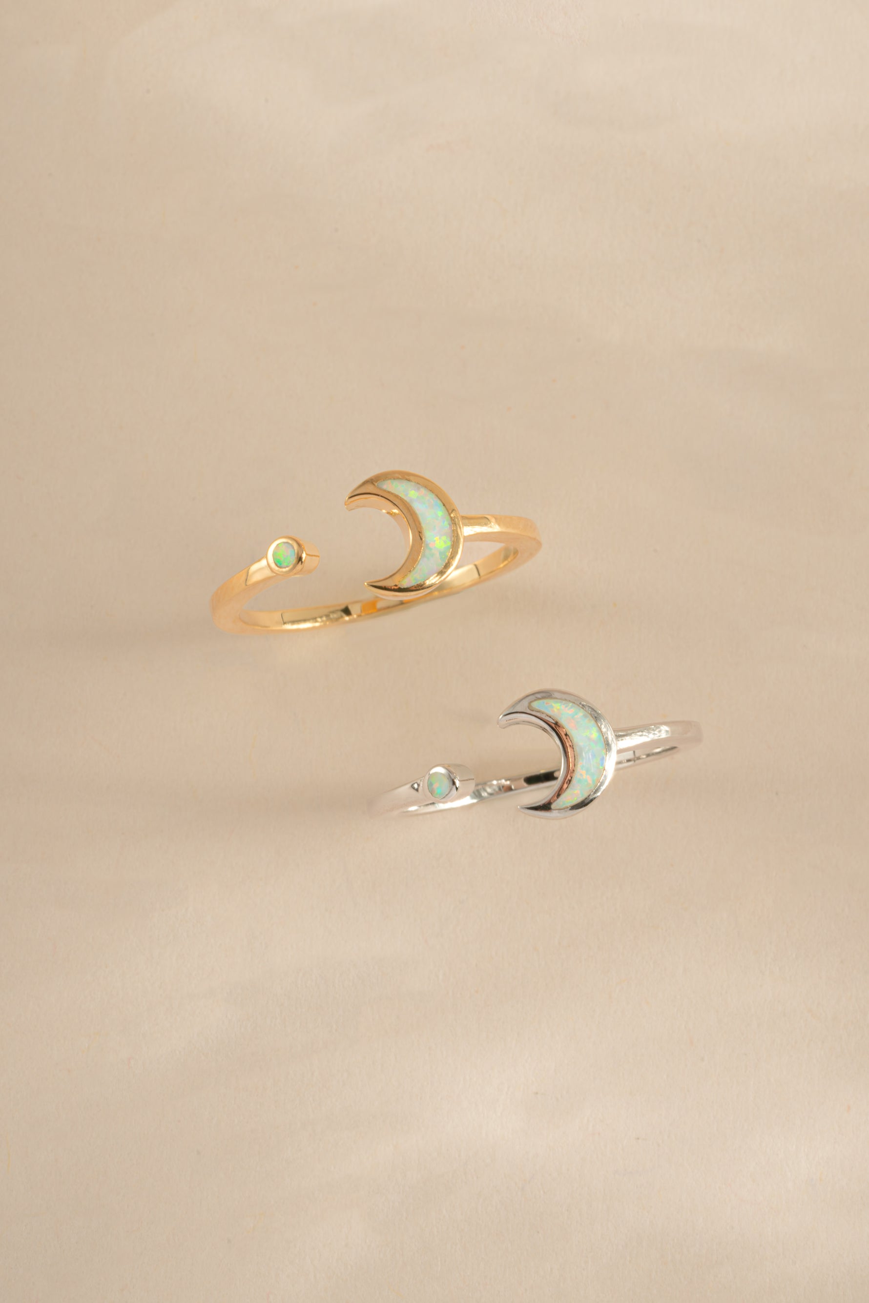 Open Opal Moon Ring by Sami Jewels featuring a gold and sterling silver band with a luminous opal moon design.
