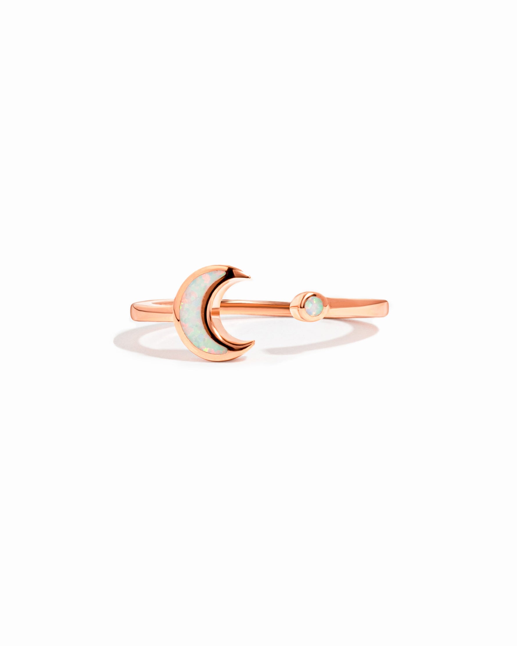 Open opal moon ring by Sami Jewels featuring a rose gold band and a shimmering opal moon gemstone.