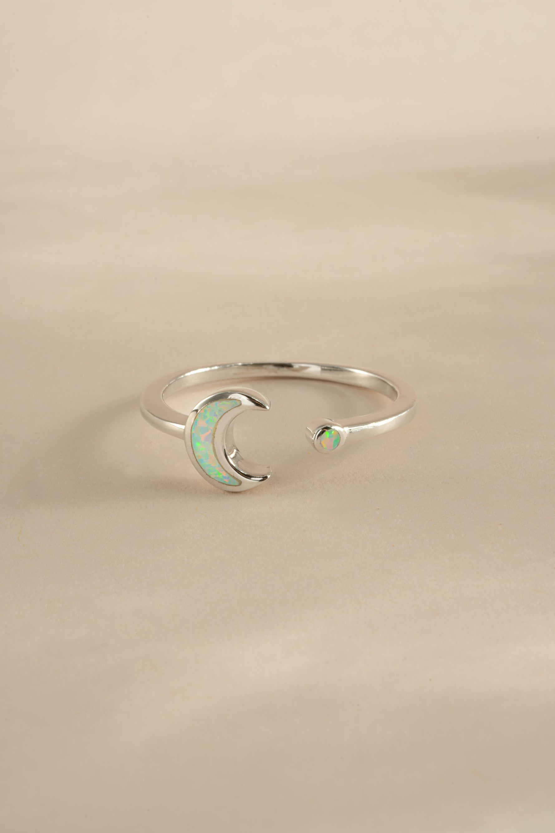 Sterling silver Opal Moon Ring by Sami Jewels featuring a luminous opal gemstone and celestial moon design.