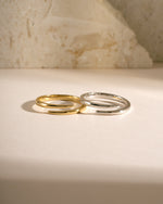 Gold and sterling silver open spiral ring from Sami Jewels, featuring a sleek, minimalist design with a modern spiral shape.