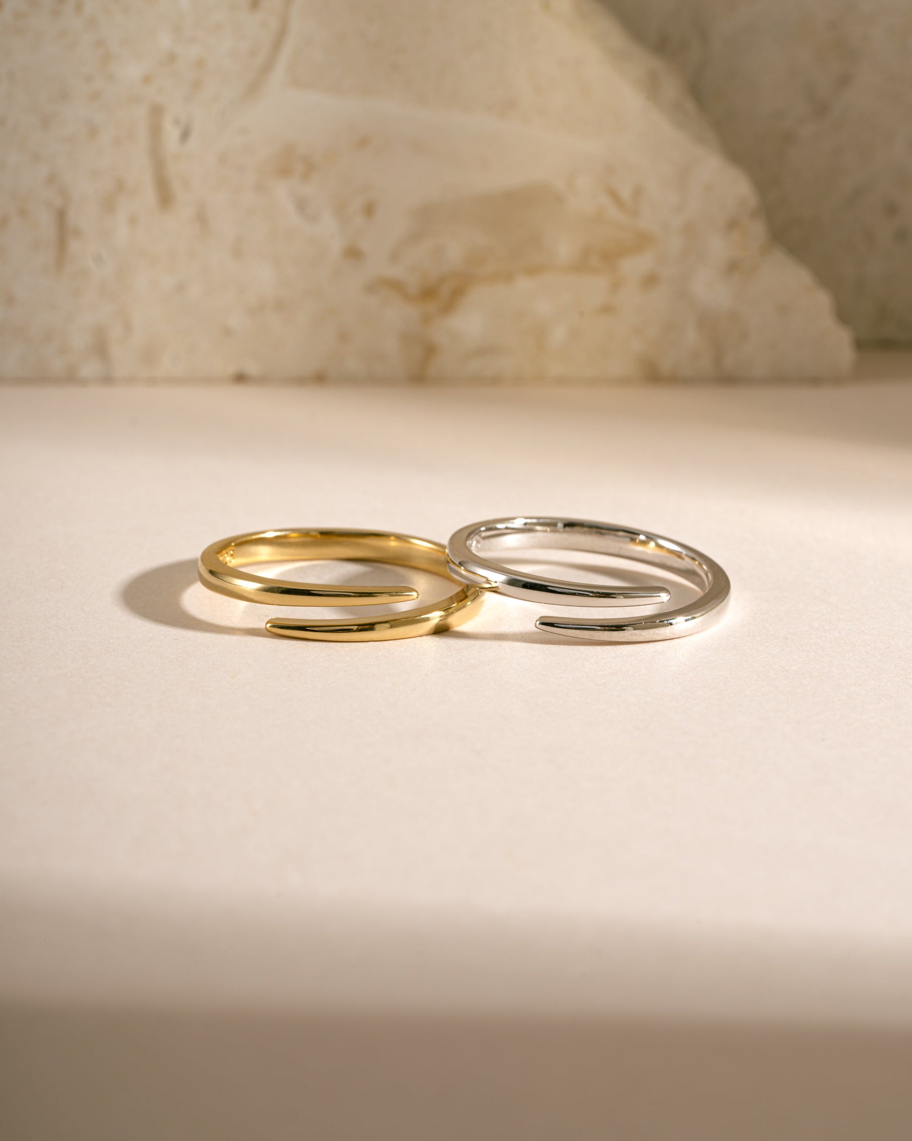 Gold and sterling silver open spiral ring from Sami Jewels, featuring a sleek, minimalist design with a modern spiral shape.