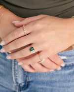 Gold open spiral ring from Sami Jewels, styled as a stackable jewelry piece with a sleek, contemporary design.