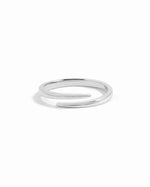 Sterling silver open spiral ring by Sami Jewels, featuring a sleek, minimalist design on a white background.