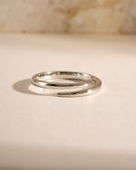 Sterling silver open spiral ring by Sami Jewels, featuring a sleek, minimalist design for everyday wear.