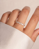 Elegant gold oval diamond ring by Sami Jewels, featuring a sparkling oval-shaped diamond on a smooth band.