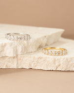 Sami Jewels oval diamond ring with gold and sterling silver band, showcasing a sparkling oval-cut diamond on a stylish ring.