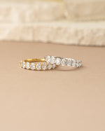 Oval diamond ring by Sami Jewels featuring a gold and sterling silver band with detailed stone accents.