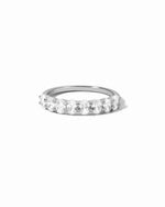 Sami Jewels oval diamond ring with sterling silver band, showcasing a sparkling oval-cut diamond on a white background.
