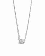 Sterling silver oval pendant necklace by Sami Jewels displayed on a white background