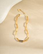 Close-up of a gold Amanda Paperclip Bracelet by Sami Jewels, showing sleek paperclip design and polished finish.