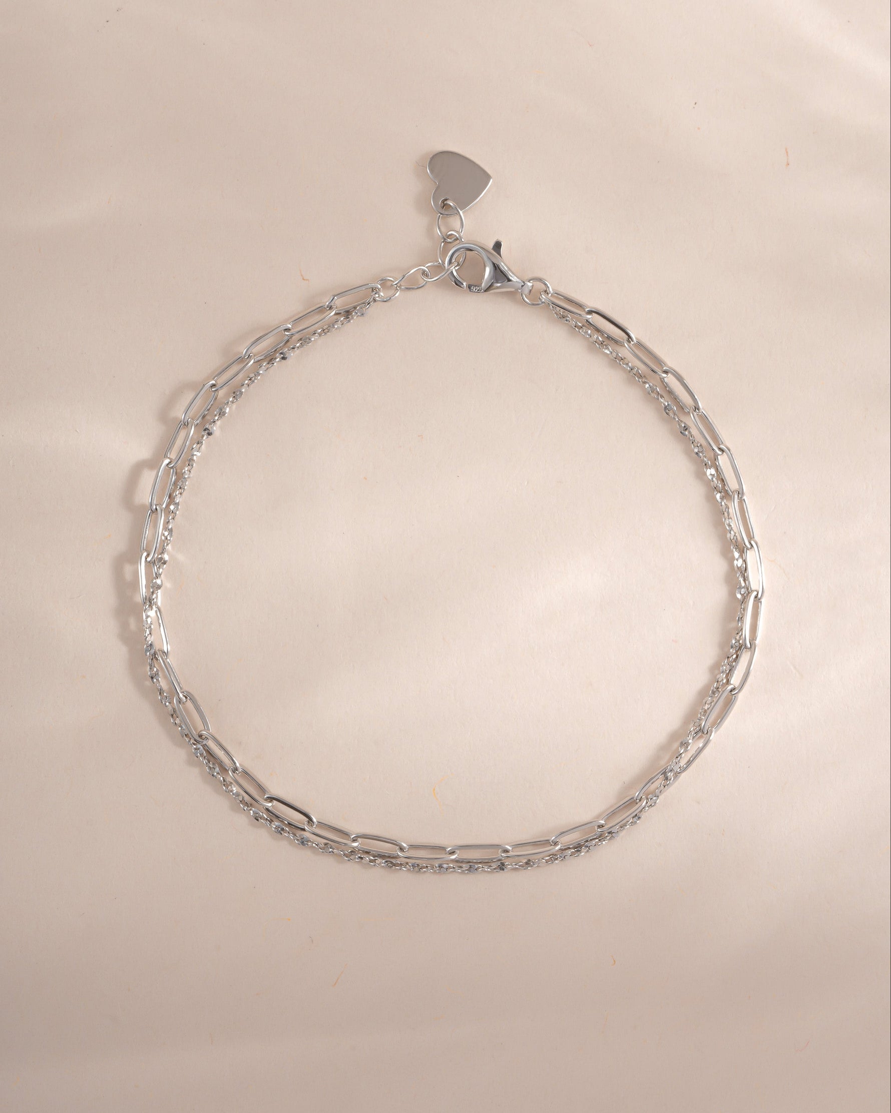 Sterling silver paperclip and chain bracelet set by Sami Jewels, showcasing sleek, modern jewelry design on a white background.