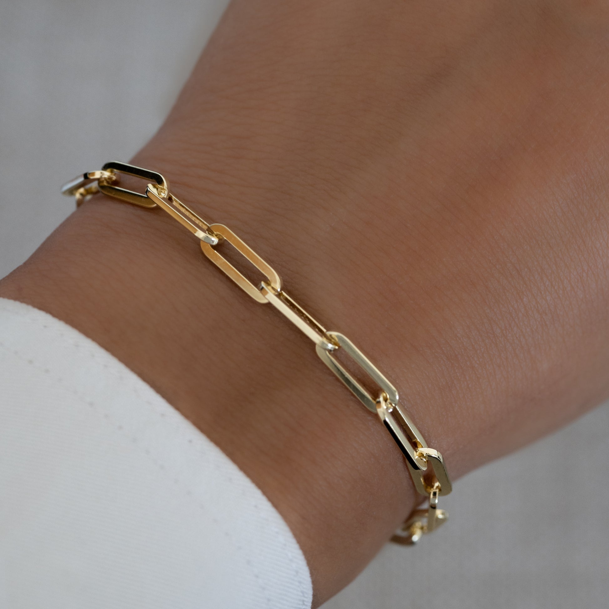 paperclip chain bracelet on a model