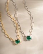 Gold and silver paperclip necklace with emerald pendant from Sami Jewels, featuring a modern and elegant jewelry design.