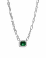 Silver paperclip necklace with emerald pendant from Sami Jewels displayed on a white background.