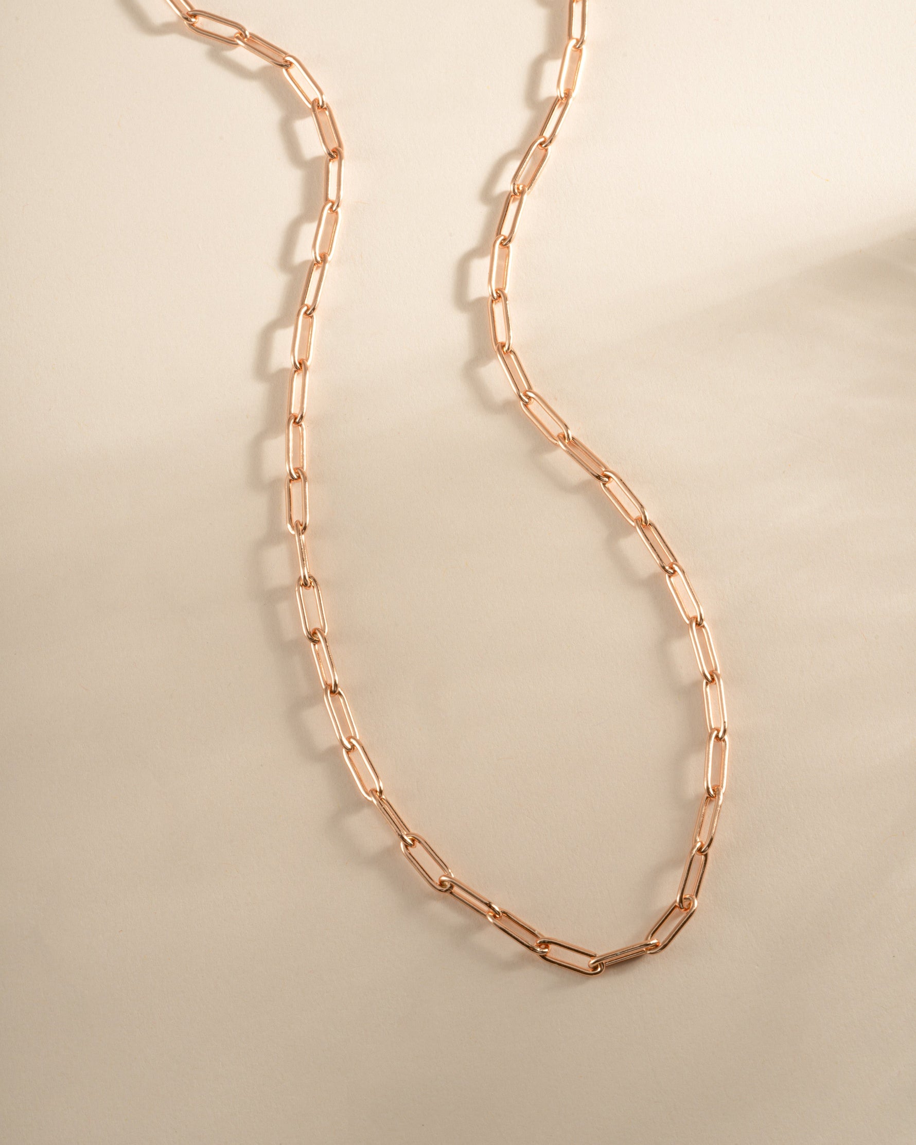 Rose gold Paperclip Necklace by Sami Jewels featuring sleek, elongated metal links on a delicate chain.