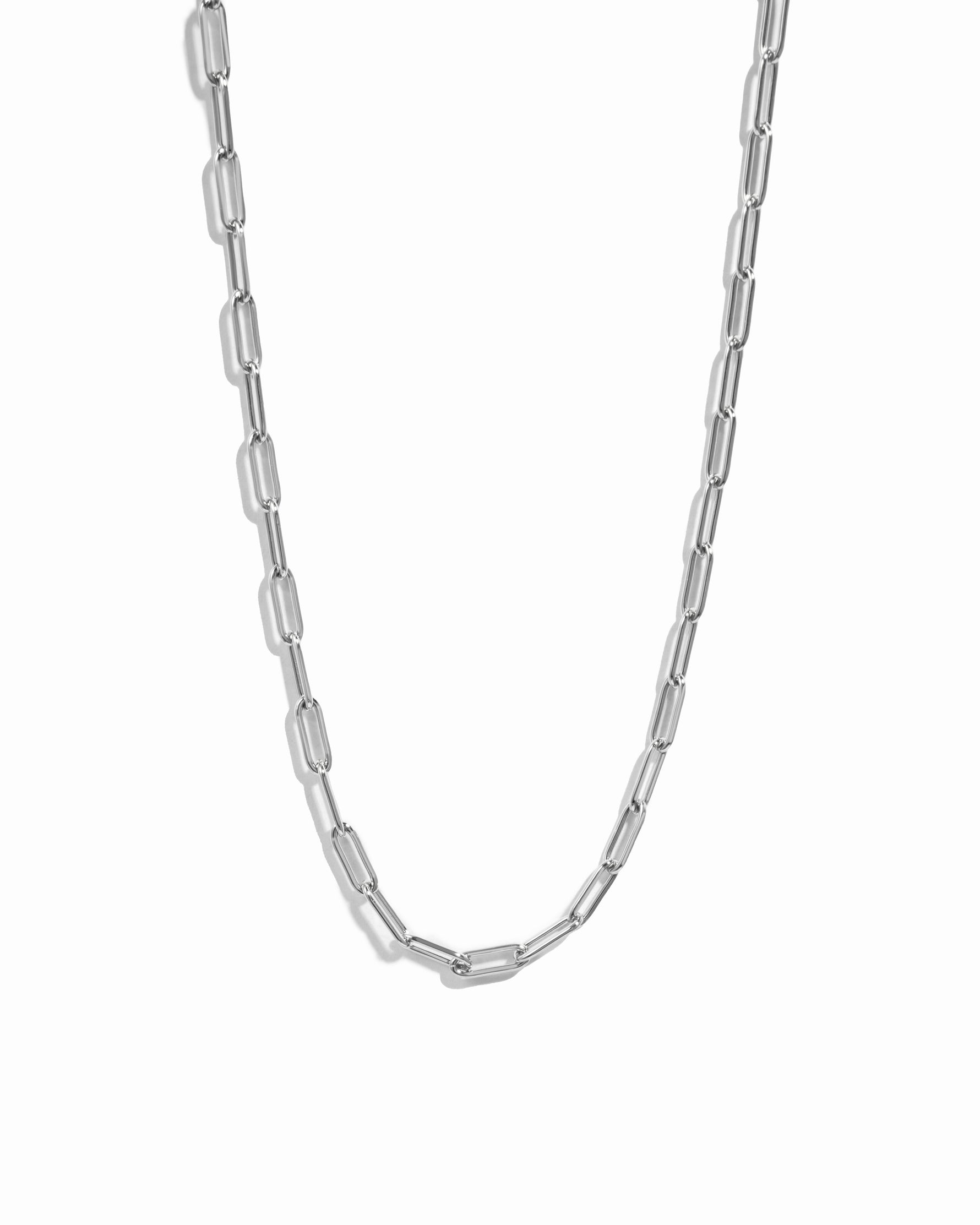 Sterling silver paperclip necklace by Sami Jewels displayed against a white background.