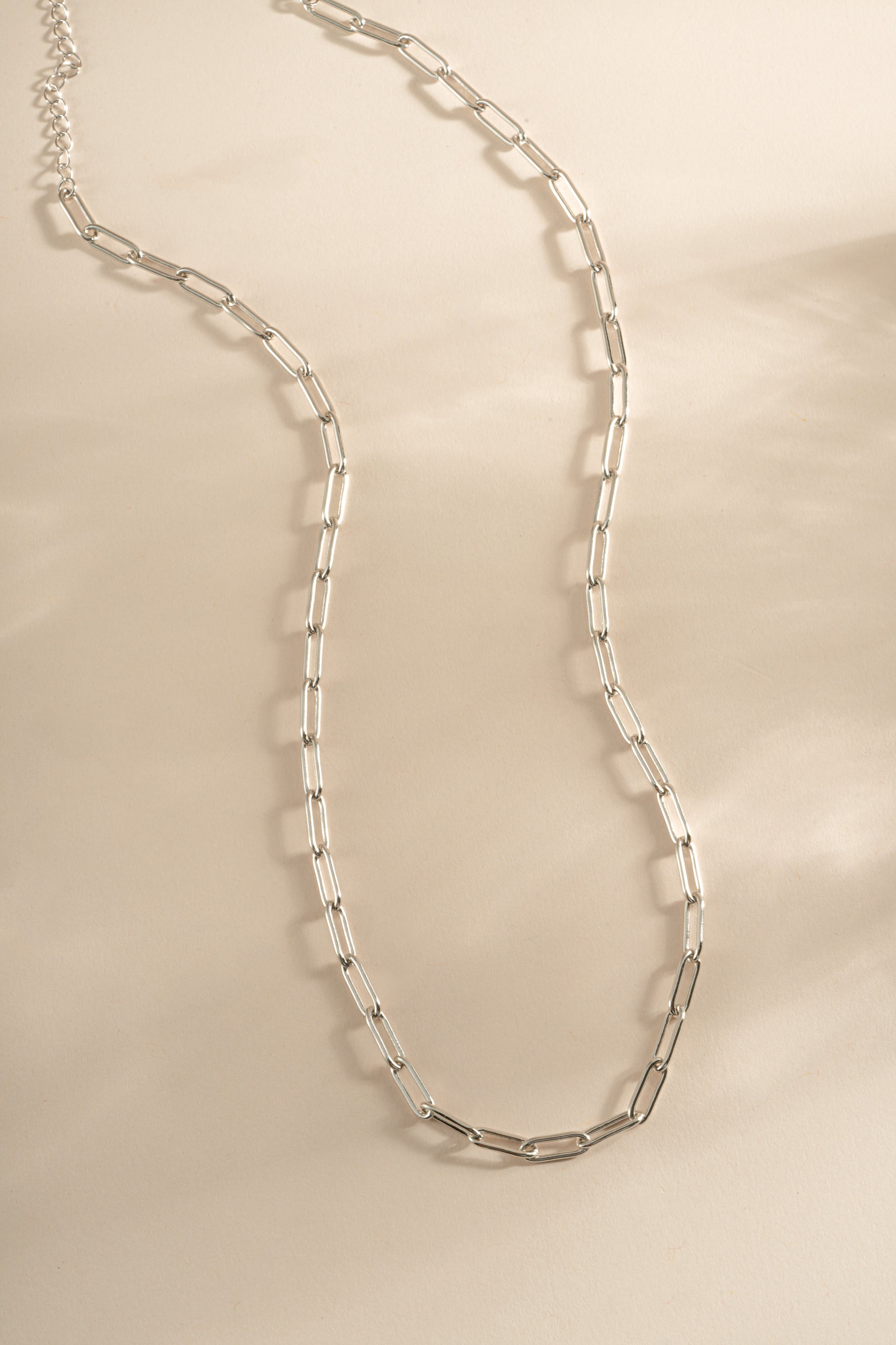Sterling silver Paperclip Necklace by Sami Jewels featuring elongated chain links on a sleek, modern jewelry piece.